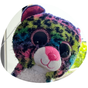 Caesar with his teddy bear friend